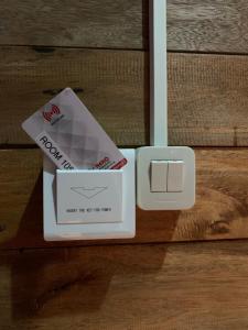 a couple of boxes sitting on top of a wooden table at Gili Davidoff Bungalow in Gili Trawangan
