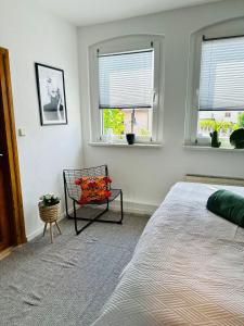 Postel nebo postele na pokoji v ubytování Lous Ferienhaus 1
