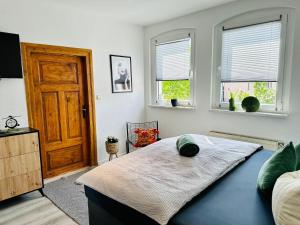 Postel nebo postele na pokoji v ubytování Lous Ferienhaus 1