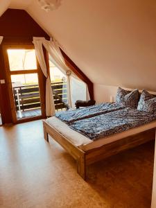 Postel nebo postele na pokoji v ubytování Ferienunterkunft Ostsee Rostock