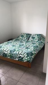 Ένα ή περισσότερα κρεβάτια σε δωμάτιο στο entre terre et mer