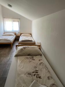 Postel nebo postele na pokoji v ubytování Ubytovani Valentovi