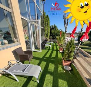 Vonkajšia záhrada v ubytovaní Piknik Wellness Hotel
