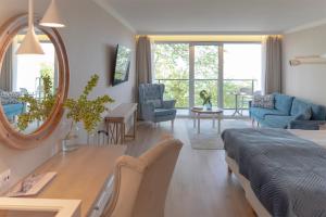 Posezení v ubytování Hotel Szerokie Wody Sea & Sand Ustka