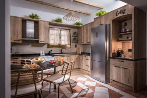 A kitchen or kitchenette at DIEVANDI SEAVIEW VILLA