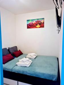 Ένα ή περισσότερα κρεβάτια σε δωμάτιο στο appartement vue mer,accès direct plage,fibre,clim,parking public gratuit