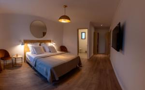 Ένα ή περισσότερα κρεβάτια σε δωμάτιο στο Comme à la maison +15 φωτογραφίες