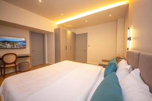 Postel nebo postele na pokoji v ubytování Illyrian Boutique Hotel