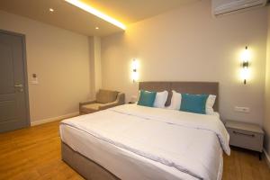 Postel nebo postele na pokoji v ubytování Illyrian Boutique Hotel