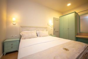 Postel nebo postele na pokoji v ubytování Illyrian Boutique Hotel