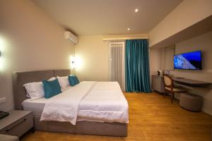 Postel nebo postele na pokoji v ubytování Illyrian Boutique Hotel