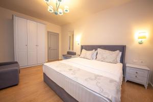 Postel nebo postele na pokoji v ubytování Illyrian Boutique Hotel