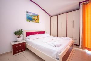 Postel nebo postele na pokoji v ubytování Hotel New Crystal