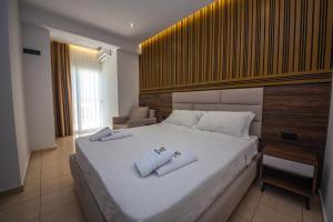 Postel nebo postele na pokoji v ubytování Hotel New Crystal