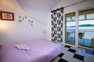 Postel nebo postele na pokoji v ubytování Villa Aurelia Vodice