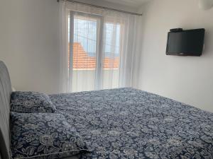 Postel nebo postele na pokoji v ubytování Apartment Sky