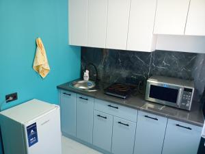 Η κουζίνα ή μικρή κουζίνα στο Квартира в центре