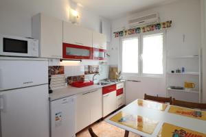 Kuchyň nebo kuchyňský kout v ubytování Villa Aurelia Vodice