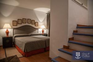 Postel nebo postele na pokoji v ubytování Hotel Boutique Casa de Orellana