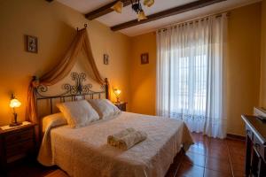 Ένα ή περισσότερα κρεβάτια σε δωμάτιο στο Casa Rural La TERRONA
