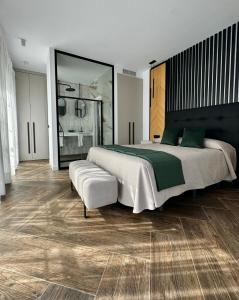 Postel nebo postele na pokoji v ubytování Hostal Noli