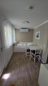 Ferienbungalows am Wolziger See客房内的一张或多张床位