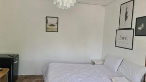 Postel nebo postele na pokoji v ubytování B&B VIA DEL CRISTO