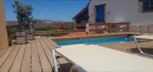The swimming pool at or close to Chrisi Traditional House