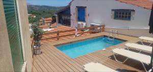 The swimming pool at or close to Chrisi Traditional House