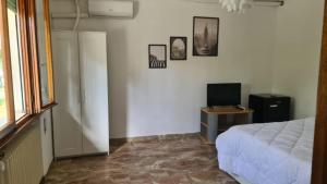 TV a/nebo společenská místnost v ubytování B&B VIA DEL CRISTO