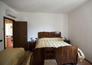 Posteľ alebo postele v izbe v ubytovaní Gran sasso white