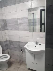 Koupelna v ubytování GREY VILLAS + 30 fotografií