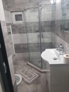 Koupelna v ubytování GREY VILLAS