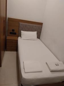Postel nebo postele na pokoji v ubytování Royale Revera