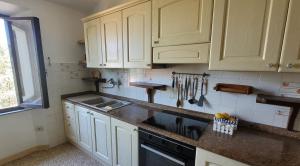 Kuchyňa alebo kuchynka v ubytovaní Agriturismo Villa Carducci