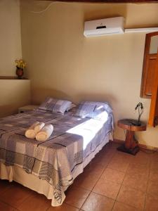 Brisa da Serra Hotel Pousada Pirenopolis客房内的一张或多张床位