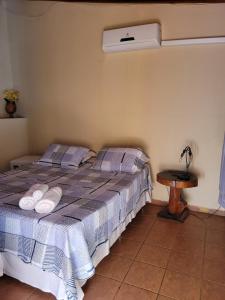 Brisa da Serra Hotel Pousada Pirenopolis客房内的一张或多张床位
