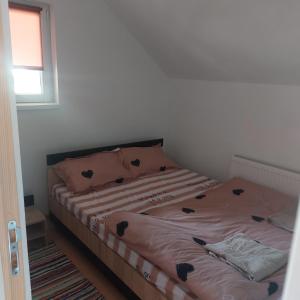 Postel nebo postele na pokoji v ubytování Cabana Imola
