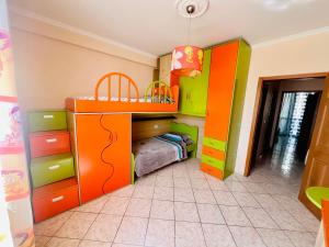 a childs bedroom with a bunk bed and a bunk bed at Lovely 3-bedroom rental unit in Durrës in Durrës