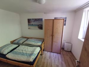 Postel nebo postele na pokoji v ubytování Ferienwohnungen Steinbichl