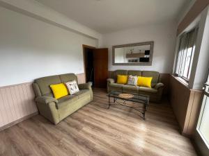 Posezení v ubytování APARTAMENTO FOZ Imr + 7 fotografií