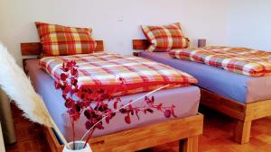 Кровать или кровати в номере Marie´s Sonnenterrasse