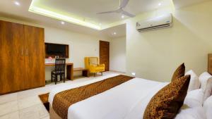 Hotel Nova Pride客房内的一张或多张床位