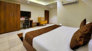 Hotel Nova Pride客房内的一张或多张床位
