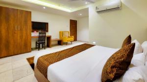 Hotel Nova Pride客房内的一张或多张床位