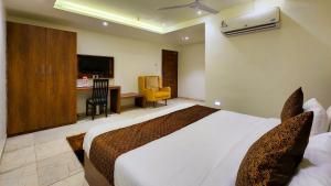 Hotel Nova Pride客房内的一张或多张床位