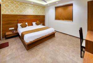 Hotel Nova Pride客房内的一张或多张床位