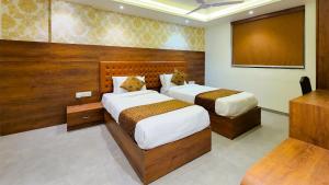 Hotel Nova Pride客房内的一张或多张床位
