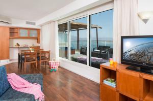 Телевизор и/или развлекательный центр в Leonardo Club Hotel Dead Sea - Все включено