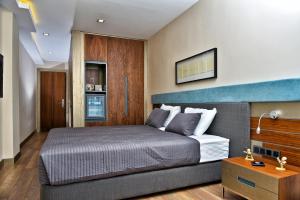 Кровать или кровати в номере Spil Suites